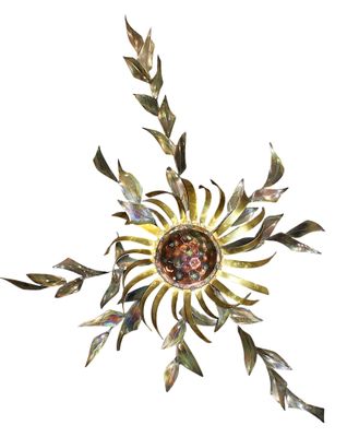 an image of a metal sunflower on a white background