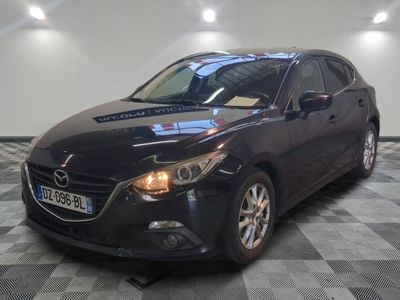 a picture of a black mazda mazda car in a showroom