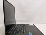 an open laptop computer sitting on top of a white table