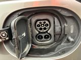 a close up of a car ' s plugged in to a car