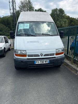 a white van that is parked on the side of the road