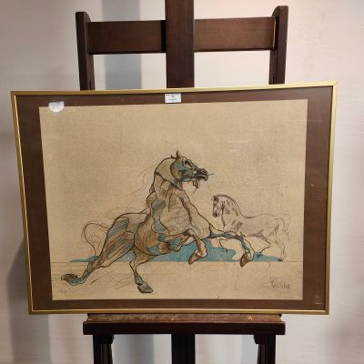 une image représentant un dessin d'un homme à cheval posé sur un chevalet