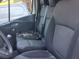 the interior of a car with the front seats down and the center console down