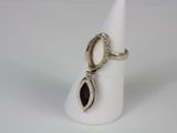 sterling silver ring with garnett and oval garnett on it