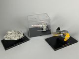 three star wars action figures on display on a table