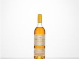 a bottle of whisky sitting on top of a table