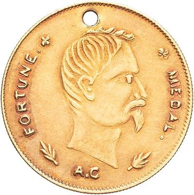 a close up of a coin with a man ' s face on it