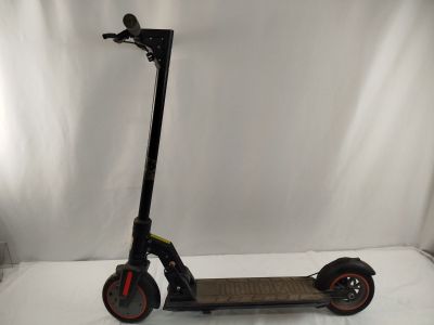 an electric scooter sitting on a white surface with a white background