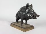 bronze sculpture of a boar on a marble base