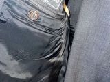 a close up of a person ' s jacket with a label on it