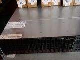 a rack with a lot of hard drives on top of it
