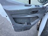 a door of a car with a hole in it