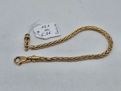 a gold chain with a clasp on a white background