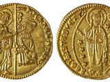 une pièce d'or sur laquelle sont représentés une femme et un homme