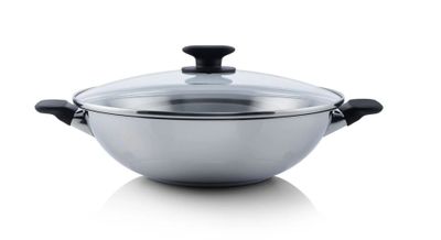 a close up of a pan with a lid on a white surface