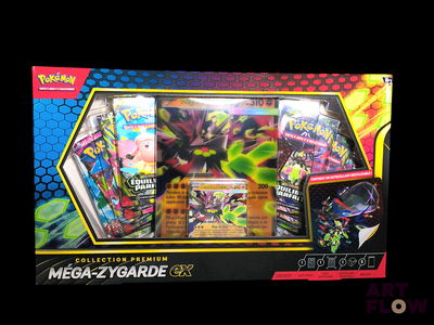 a box of pokemon cards and a box of cards on the table