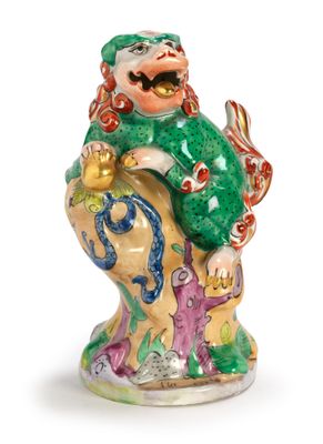une image représentant une figurine d'un homme avec un poisson sur le dos