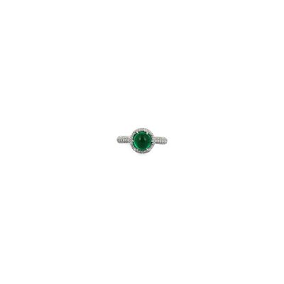 une image d'une bague sertie d'un diamant et d'une émeraude sur fond blanc