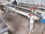 a machine that is working on a conveyor belt