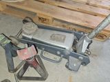 a picture of a hand truck with tools on the floor