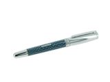 un stylo posé sur une surface blanche