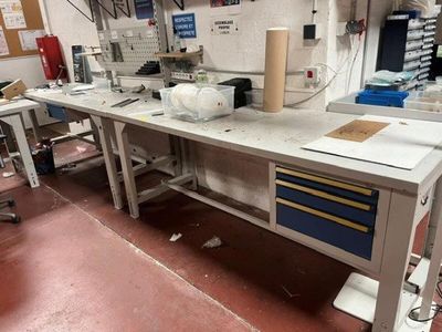 an image of a workbench in a factory with a lot of tools