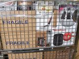 a cart full of boxes sitting in a warehouse