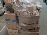 a large pile of boxes sitting on top of a pallet in a warehouse