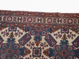 an image of a rug with a pattern of flowers on it
