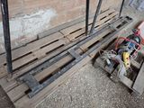 a wooden pallet with a bunch of wires attached to it