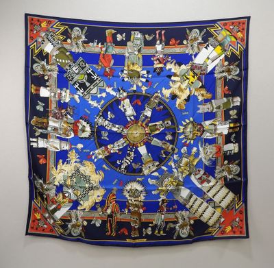 an image of a blue and red scarf hanging on a wall