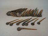 a lot of nails that are laying on a table