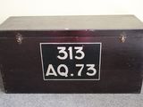 a black box with a number on it sitting on the floor