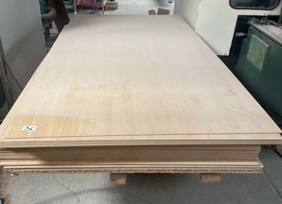 several pieces of plywood are stacked on top of each other