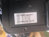 a close up of a cell phone with a barcode on it