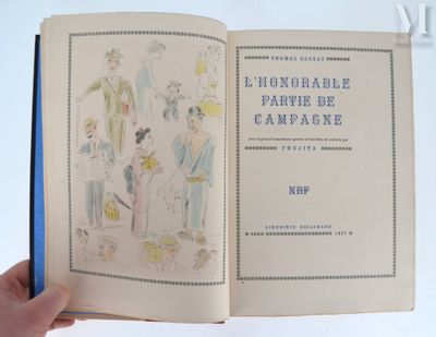 a person holding a book in their hand that is open