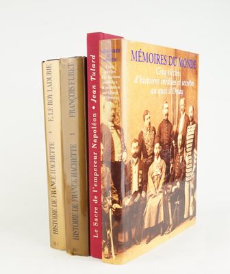 two books on a white background with a picture of a group of people