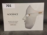 an image of a box with a white mask on top of it