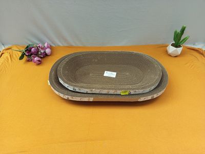 yellow table cloth with two plates and a vase on it