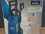 packaging of a blue pressurer sitting on top of a wooden table