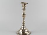 silver plated candle holder on a white background with a gray background