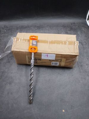 a box and a pair of scissors in the back of a truck