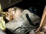 a bag sitting on top of a bed in a room