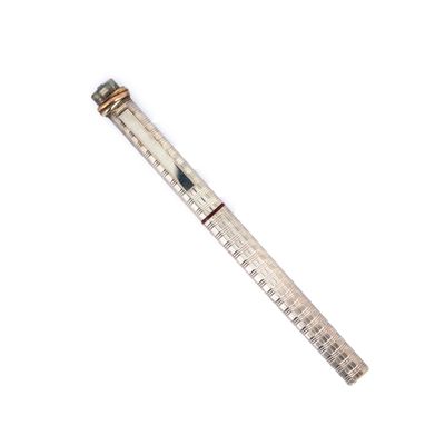 a ruler that is laying on a white surface