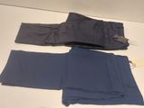 two pairs of blue pants and a pair of grey pants