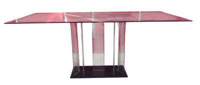the table is made of glass and has a metal base