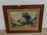 une photo d'un tableau accroché au mur à côté d'un vase