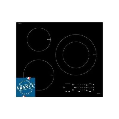 a black stove top with three burners and a blue label on it