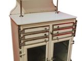 a white and red cabinet with a glass door