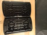 a black case that is open on a wooden table